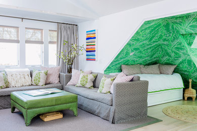 Example of a classic loft-style family room design in Denver with green walls