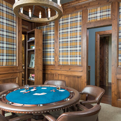 Game room - rustic enclosed carpeted game room idea in Denver with multicolored walls
