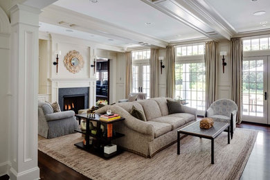 Example of a classic family room design in Boston