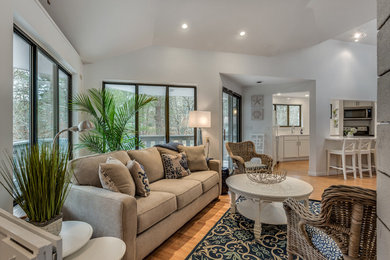 Example of a beach style family room design in Boston