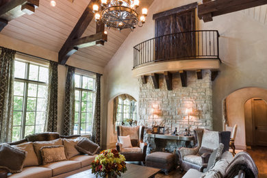 Diseño de sala de estar tradicional extra grande con suelo de madera oscura