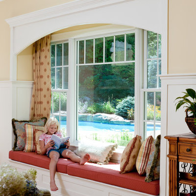 Example of a classic family room design in Boston