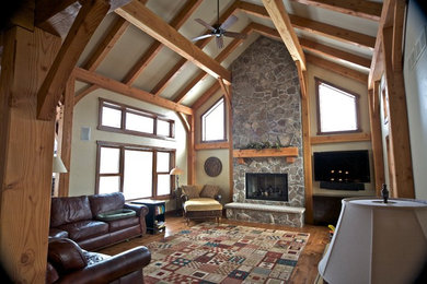 Example of a mountain style family room design in Burlington