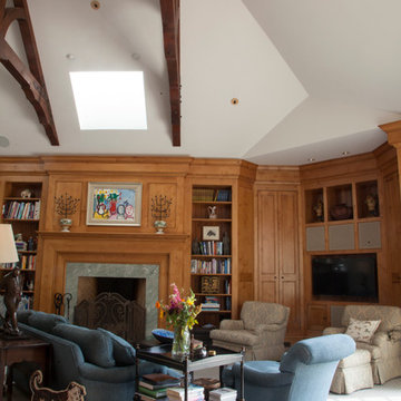 Wood Paneled Family Room with Exposed Beams