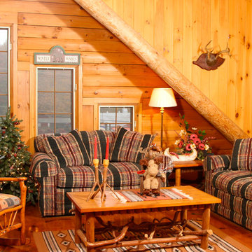 Wooden Cabin Family Room with a vaulted ceiling