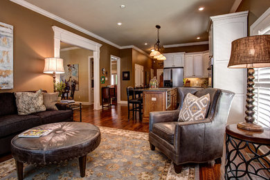 Family room - mid-sized transitional open concept dark wood floor and brown floor family room idea in Little Rock with brown walls and a wall-mounted tv