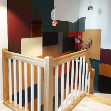 Designerferienwohnung mit Ledertapete im Treppenaufgang