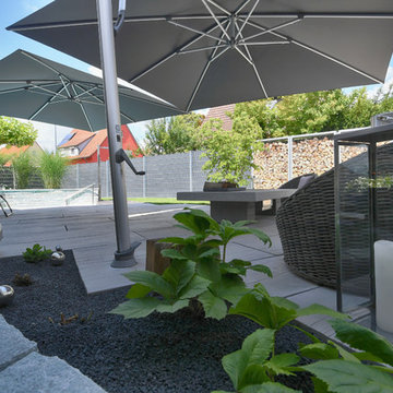 Ein moderner Familiengarten mit Pool