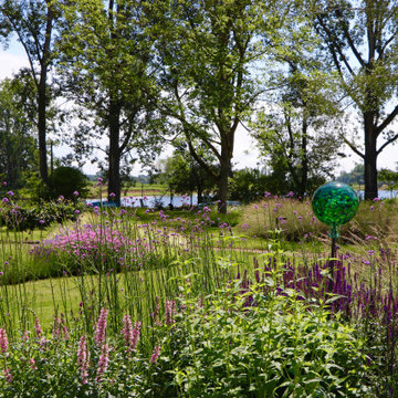 Haus am See - Blick über den Garten zum See