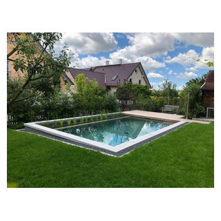 Kleiner Garten mit Naturpool Jardin Munich par Schweiger Gärtner