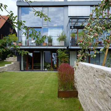 Moderne und offene Gartenanlage für ein Architektenhaus