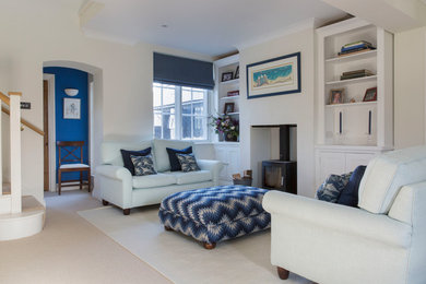 Example of a farmhouse family room design in Hampshire