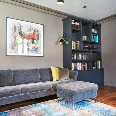 Example of a mid-sized trendy family room design in Dublin