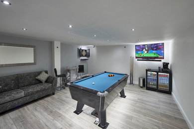 Design ideas for a modern games room in Other.