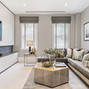 This is an example of a contemporary enclosed games room in Surrey with grey walls, a built-in media unit and grey floors.