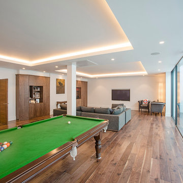 Stunning games, family and entertainment room, spanning the width of the propert
