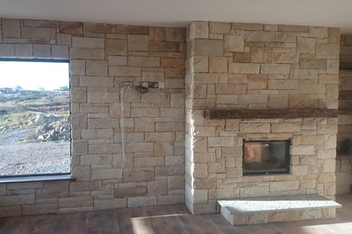 Wall and fireplace in sandstone cladding . Connemara, Co Galway