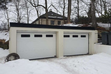 Источник вдохновения для домашнего уюта: большой отдельно стоящий гараж в скандинавском стиле для двух машин