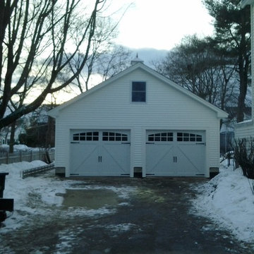 24'x24' Detached garage with loft boasts carriage style doors and cupola