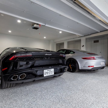 A Lamborghini Huracan and Porsche GT3 share a brand new epoxy garage floor