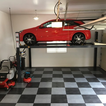 An Elevated Home Garage with RACEDECK® Garage Flooring