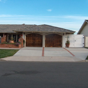 Arched Mahogony Stained Garage Doors