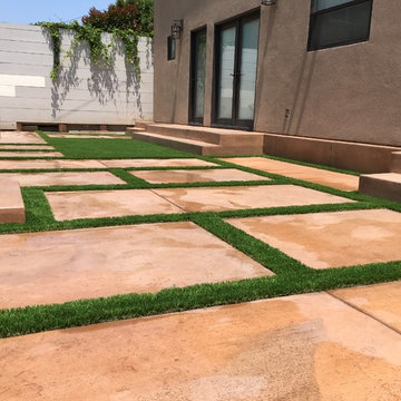 Artificial Grass Installation Between Concrete