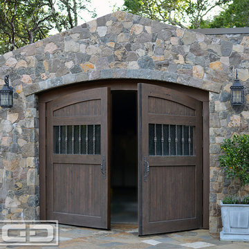 Automatic Out-Swing Carriage Doors in an Authentic Tuscan Design