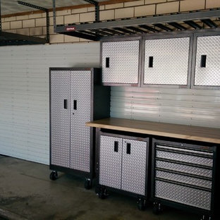 Inspiration for a mid-sized transitional garage workshop remodel in Denver