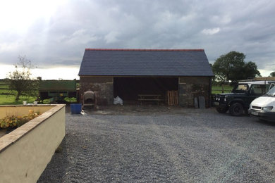 Photo of a rustic garage conversion in Other.