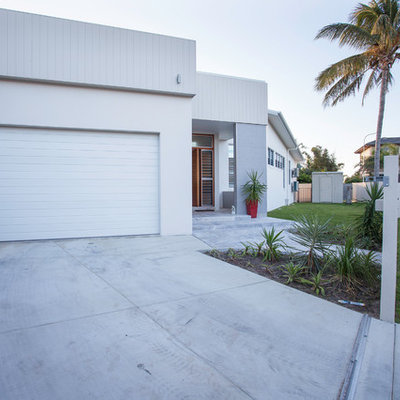 Carport - mid-sized coastal attached two-car carport idea in Other