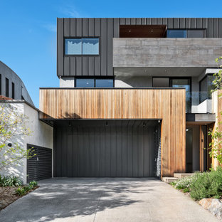 Inspiration for an expansive contemporary attached one-car garage in Melbourne.