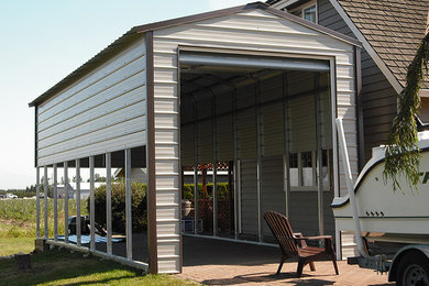 Mid-sized elegant detached one-car carport photo in Vancouver