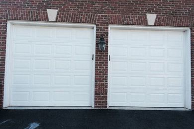Design ideas for a medium sized modern attached double garage in Baltimore.