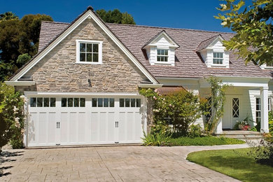 Example of a mid-sized classic attached two-car garage design in Los Angeles