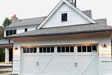 Inspiration for a farmhouse two-car garage remodel in Chicago
