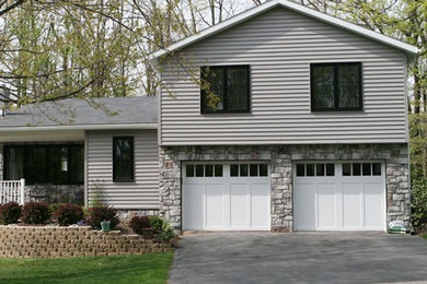 Example of an arts and crafts garage design in Other