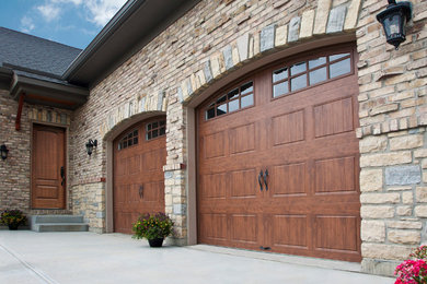 This is an example of a medium sized mediterranean attached double garage in Raleigh.