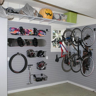 Example of a mid-sized arts and crafts attached garage design in Denver