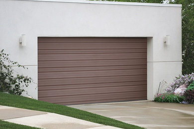 Immagine di un garage per due auto connesso moderno di medie dimensioni