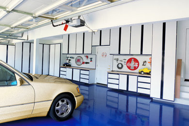 Large minimalist attached three-car garage photo in Sacramento