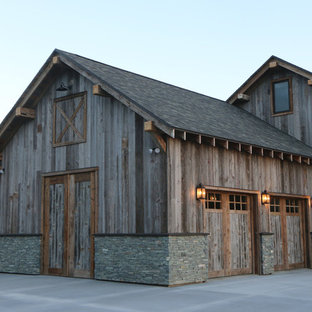 Garage - rustic attached two-car garage idea in Other
