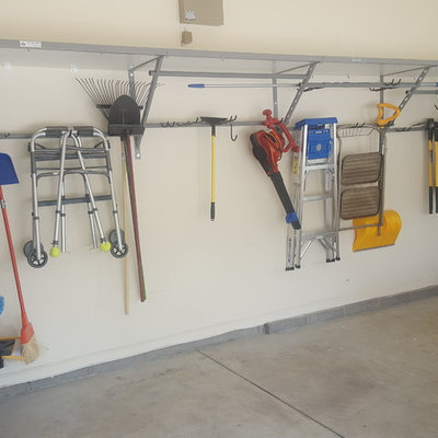 Mid-sized transitional attached two-car garage photo in Philadelphia