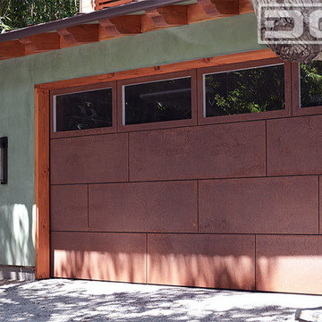 Dynamic Garage Door Design With Corten Steel Cladding & Windows
