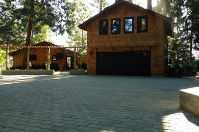 Mid-sized arts and crafts detached two-car garage workshop photo in Seattle
