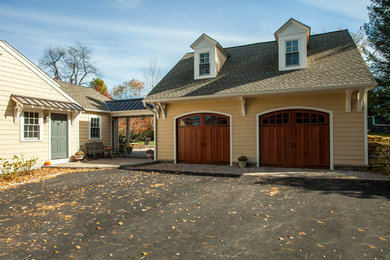 Inspiration for a large timeless two-car garage remodel in Philadelphia