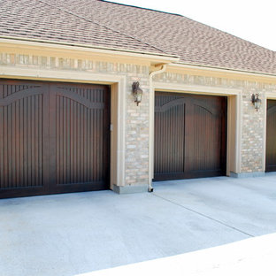 Elegant Arch Wood Doors in a Carriage Style by Cowart Door Systems