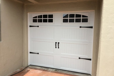 Example of a transitional garage design in San Diego