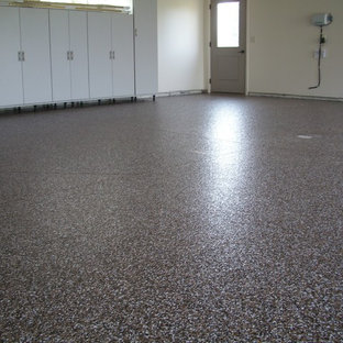Example of a minimalist garage design in Other