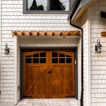 Exterior makeover with stained cedar shake siding and wood accents